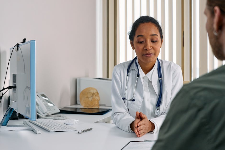 Female doctor consulting a woman patient in a modern medical office for preventive care
